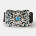 Black faux suede Western belt with a silver-tone floral buckle and turquoise-colored accents