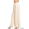 Sand beige wide leg pants with elastic high waist and flowy drape