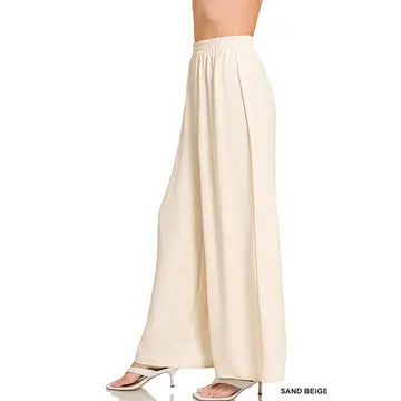 Sand beige wide leg pants with elastic high waist and flowy drape