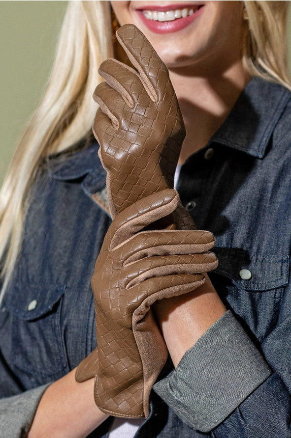 Model wearing brown full-finger gloves with quilted detailing