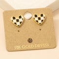 Gold dipped heart stud earrings with a black-and-white checkered pattern on a kraft display card