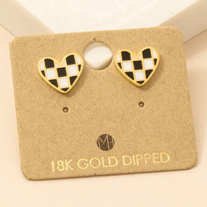 Gold dipped heart stud earrings with a black-and-white checkered pattern on a kraft display card