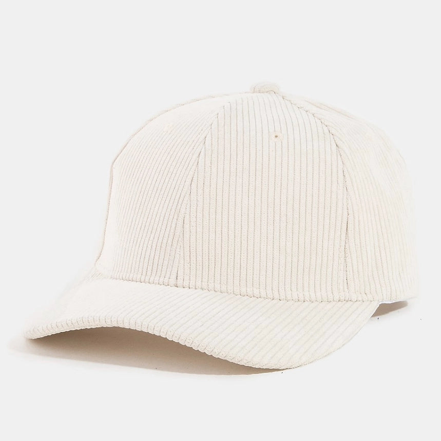Ivory corduroy trucker hat with a curved brim and ribbed texture