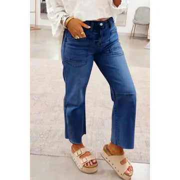 Mid Rise Frayed Medium Wash Cropped Jeans