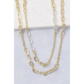 Mixed gold-tone and silver-tone chain link necklace with elongated links and finer chain sections