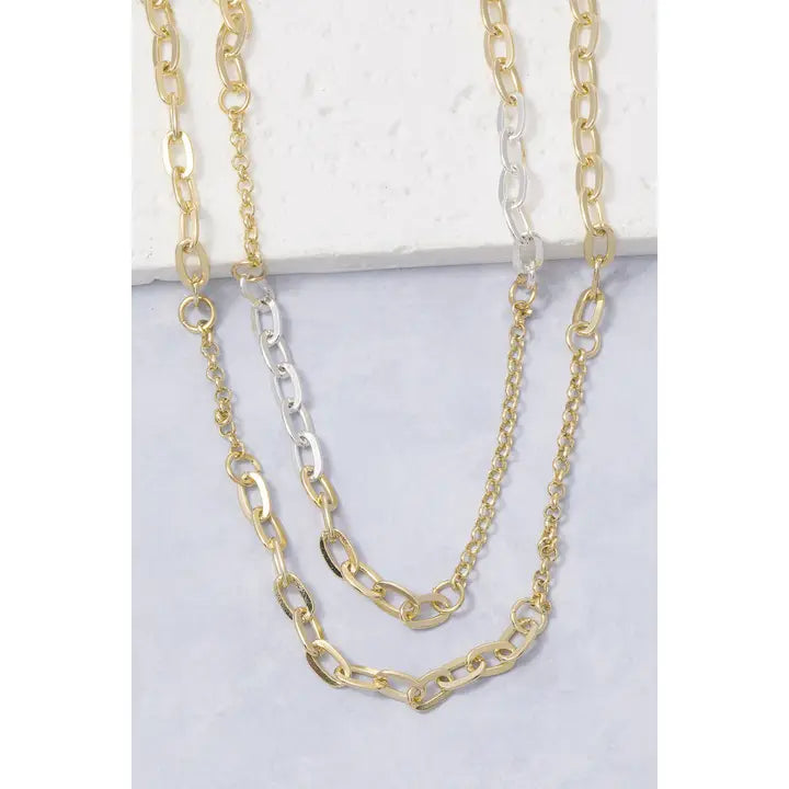 Mixed gold-tone and silver-tone chain link necklace with elongated links and finer chain sections