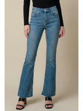 Artemis Vintage high-rise modern bootcut jeans in blue denim, styled with a black top and heeled sandals