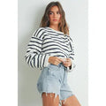 Black and white nautical striped sweater with relaxed crew neck