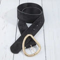 Black vegan suede belt with adjustment holes and a textured gold-tone rounded triangular buckle