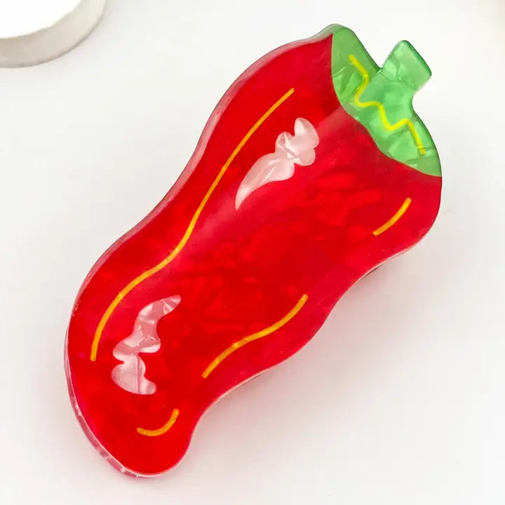 Chili Pepper Claw Clip in red acetate with yellow stripe detail and green stem top