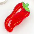 Chili Pepper Claw Clip in red acetate with yellow stripe detail and green stem top