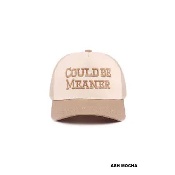 Ash mocha Could Be Meaner canvas trucker hat with light front panel, brown lettering, and contrasting curved brim