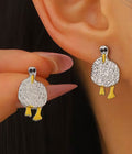 Silly Gull chubby seagull stud earrings in silver-tone with yellow enamel legs and beak