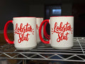 White ceramic mug with red handle and interior, bold red Lobstah Slut script on front