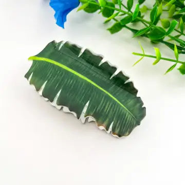 Tropical Leaf Claw Clip sculpted as a lush banana leaf in deep forest green with lime green center vein and delicate silver serrated edges