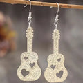 Iridescent glitter acrylic guitar drop earrings with heart cutouts on silver French hooks