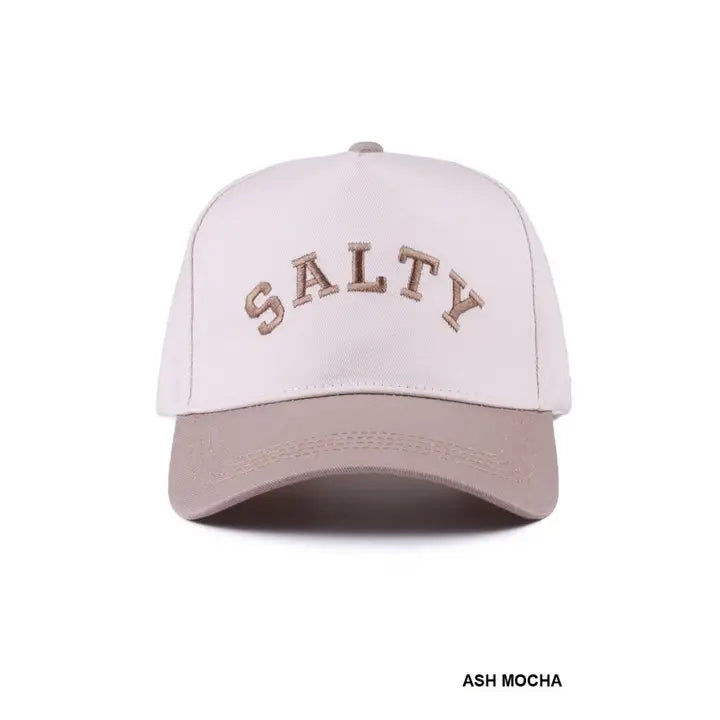 Two-tone Salty hat with a light crown, neutral curved brim, and arched SALTY lettering