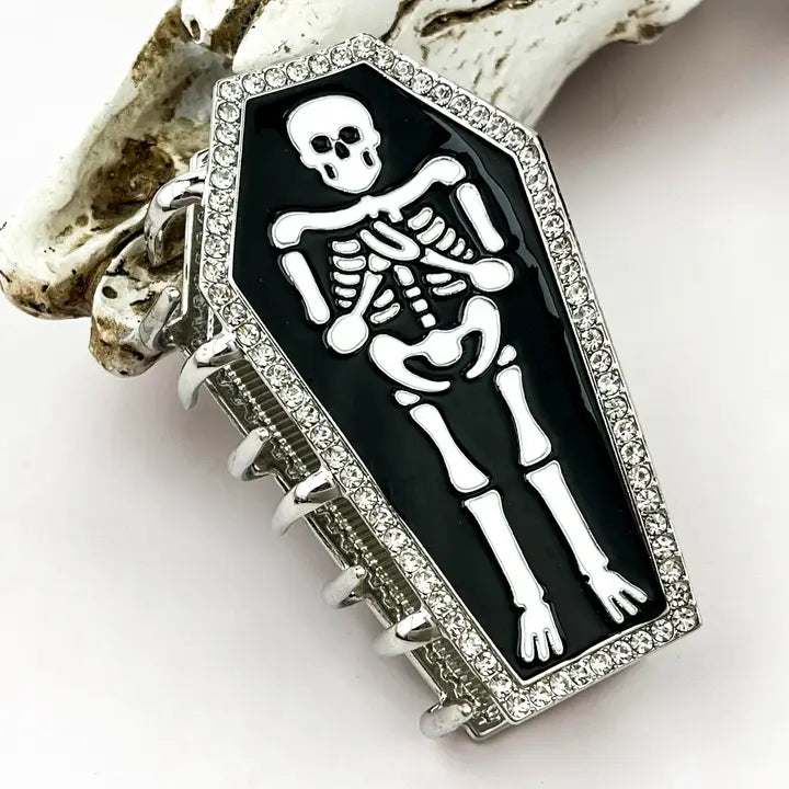 Rhinestone Skeleton Claw Clip in black with white skeleton graphic and full rhinestone border on silver hardware