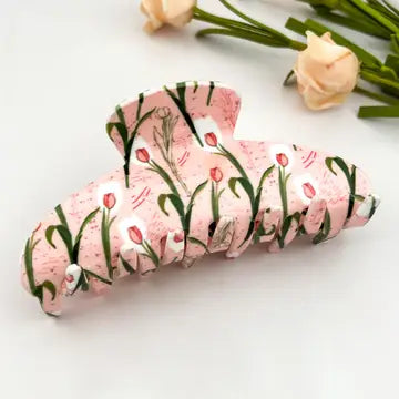 Pink Tulip Claw Clip in blush pink ruched acetate with all-over red tulip and green stem print pattern